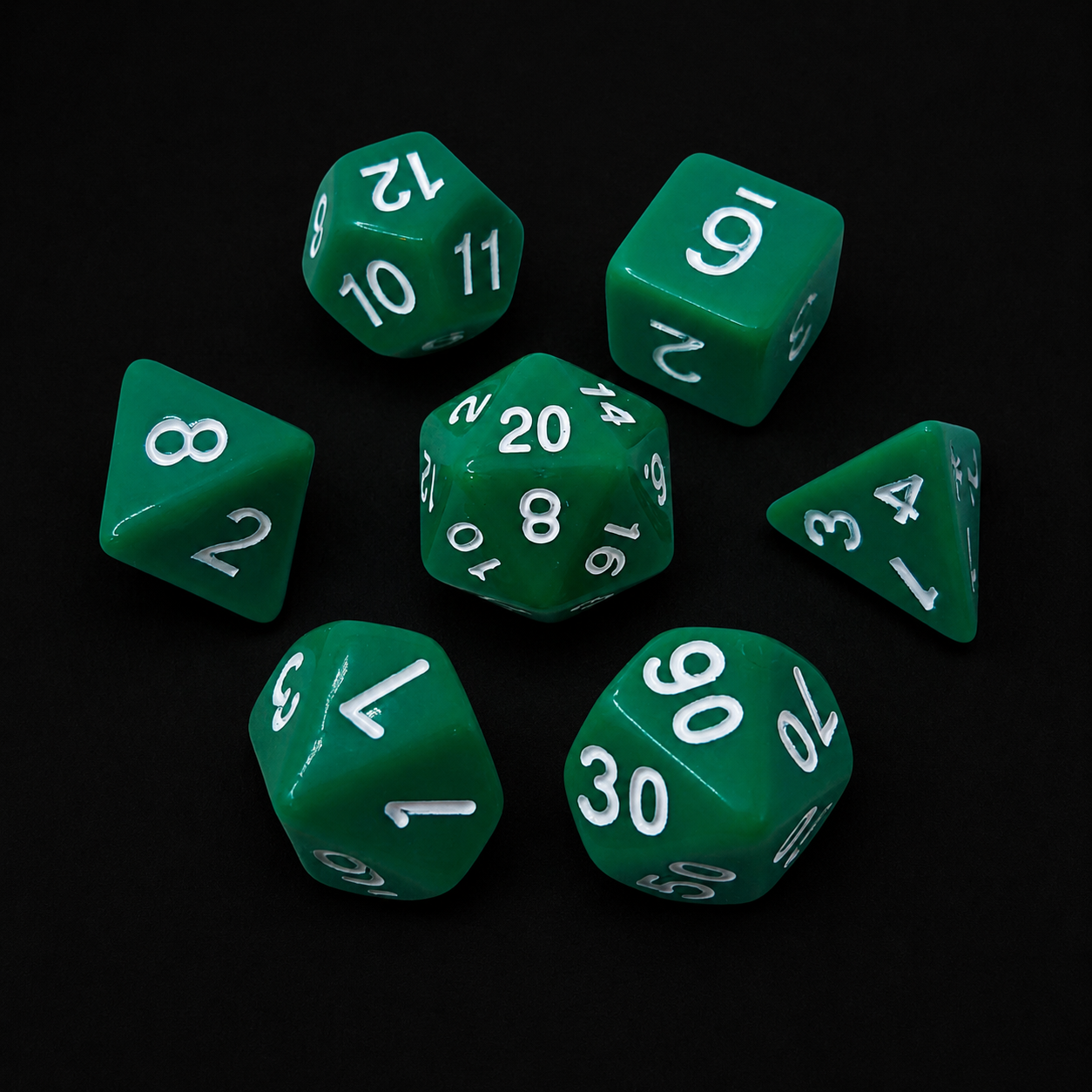 Green polyhedral dice set on a black background