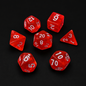 Set of red dice with white numbers on a black background
