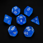 Set of blue polyhedral dice on a black background